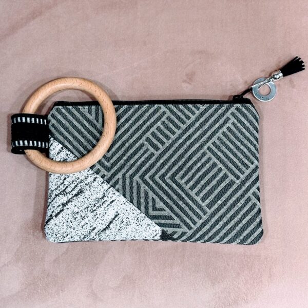 Custom made bag with grey print fabric and wood handle.